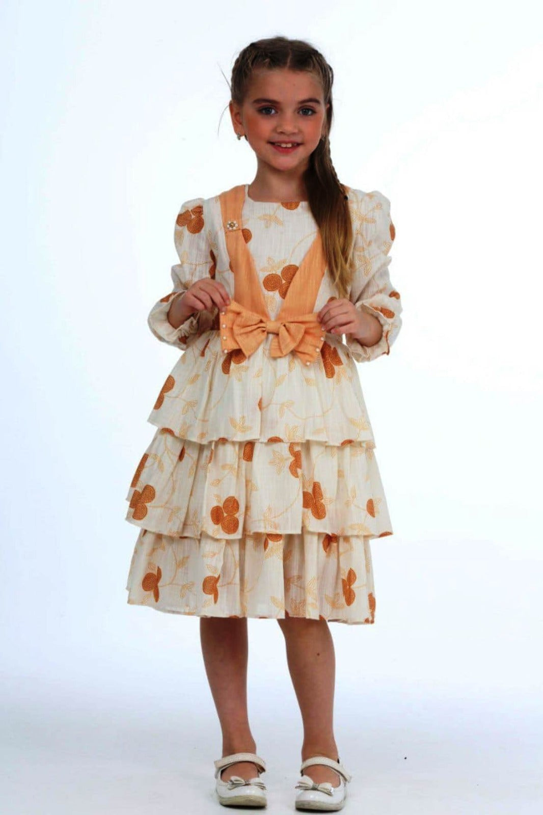TRENDT MODA ÖNÜ FİYONKLU İNCİLİ ASTARLI KREM ÜZERİNE SARI ÇİÇEKLİ ELBİSE